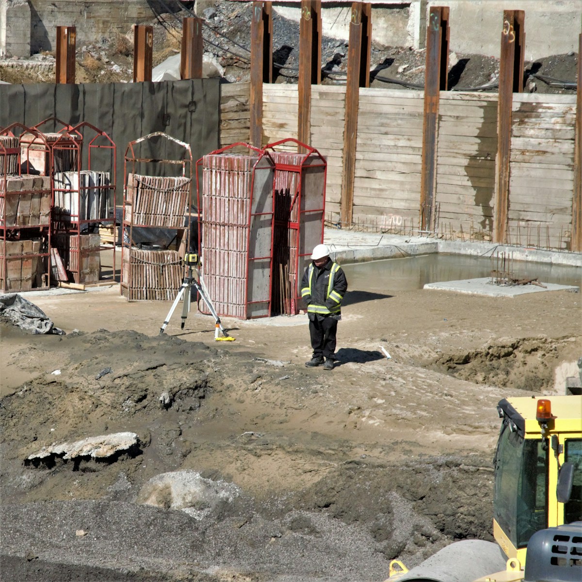 person standing near red panel